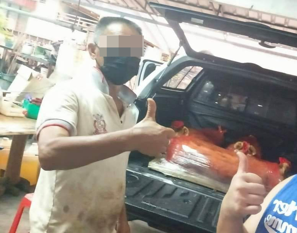 A photo allegedly showing the suspect working at a roast pork restaurant in Port Dickson.