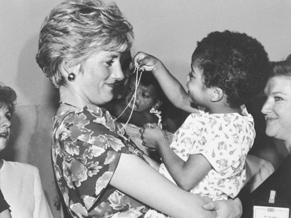 Diana, Princess of Wales, hugs a child with AIDS in 1991.