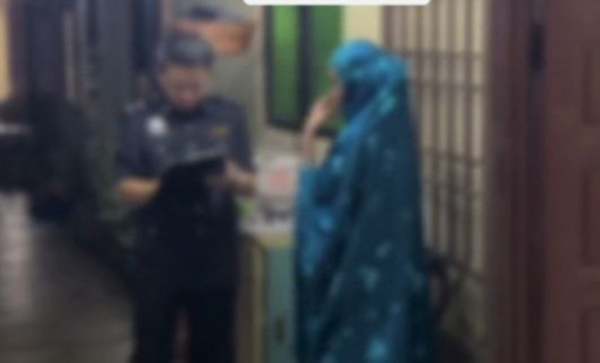 A screenshot from a viral video shows the victim's family member being interviewed at the scene of the incident.