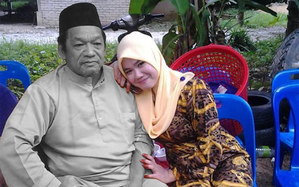 Nurul Akmal Sulaiman (right) and her father, Sulaiman Mohd.