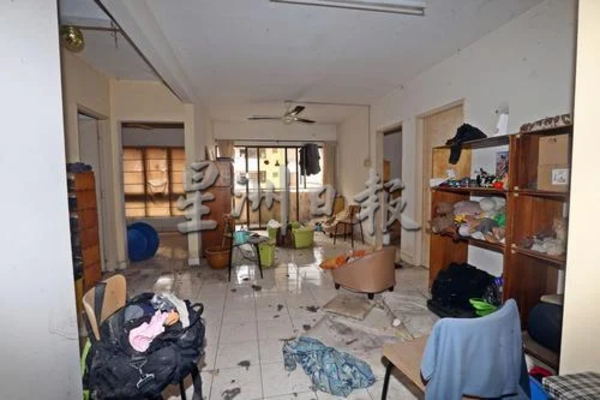 The living room of the condominium unit the deceased lived in.