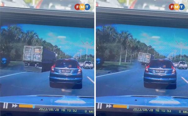 A dashcam video shows the lorry speeding on the left lane before crashing into vehicles on Persiaran Utara.