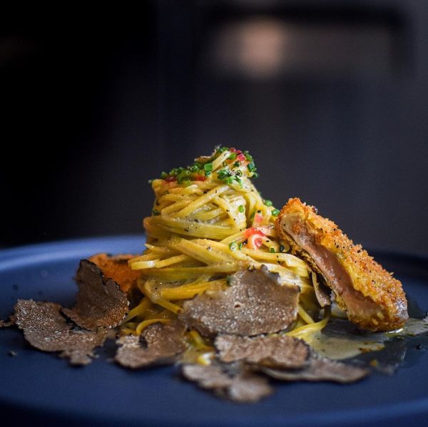 Tagliolini in Albufera Sauce served with Foie Gras Nugget and Fresh Summer Black Truffles.