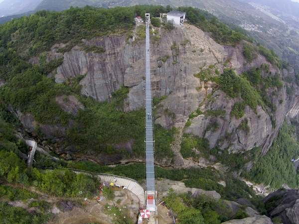 The park's glass bridge hovers 182 metres above a canyon.