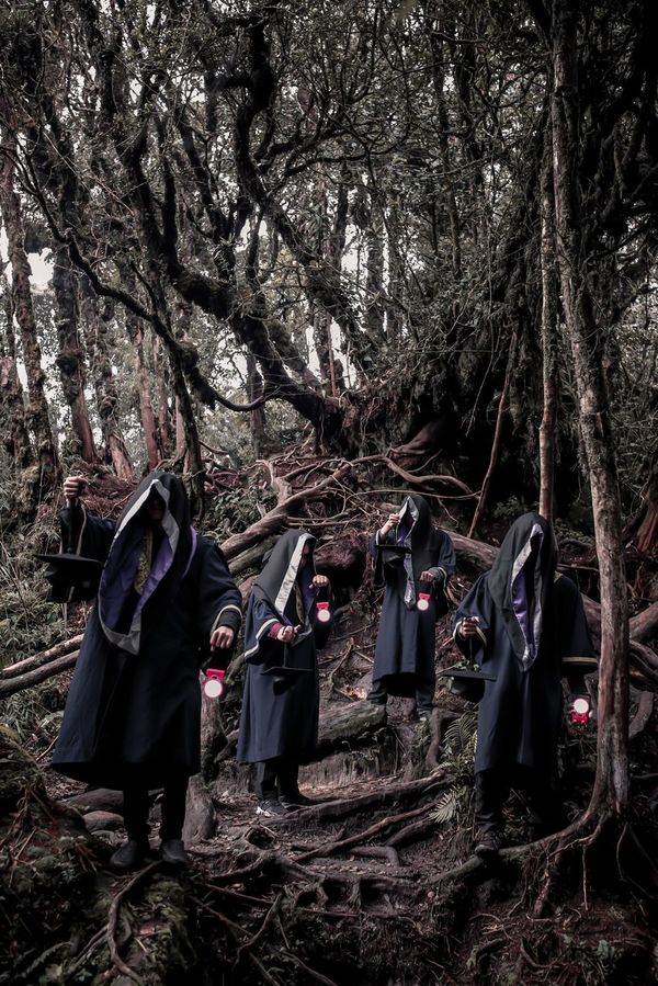 Zulhilmi and his friends in their convocation outfits from years ago.