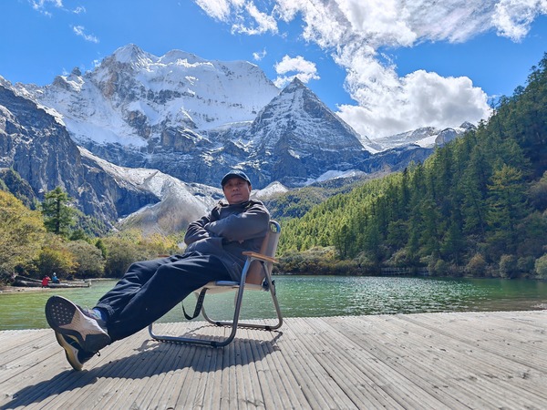 Wang at Pearl Lake in Yading, Sichuan.