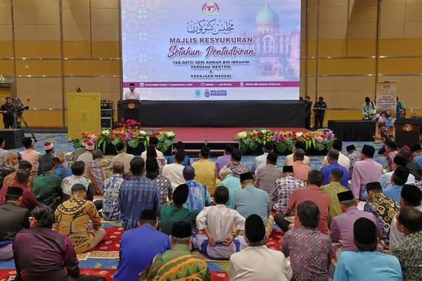 Prime Minister Datuk Seri Anwar Ibrahim delivering his address during a ceremony in Putrajaya celebrating the one-year anniversary of the Madani government.