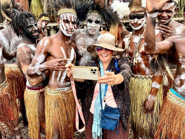 Luisa with Asmat tribes in Papua New Guinea.