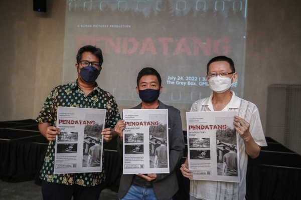 From left: Kuman Pictures managing director Amir Muhammad, director Ng Ken Kin, and scriptwriter Lim Boon Siang at a media briefing for 'Pendatang' in July 2022.