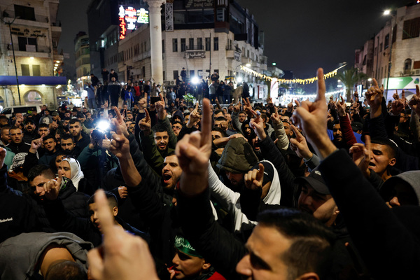 Palestinians taking part in a protest against the killing of senior Hamas official, Saleh al-Arouri, in Ramallah in the Israeli-occupied West Bank.