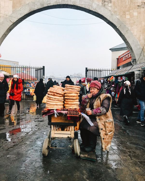 A Kyrgyz woman sells lepioshka, a traditional bread, in Bishkek, Kyrgyzstan.