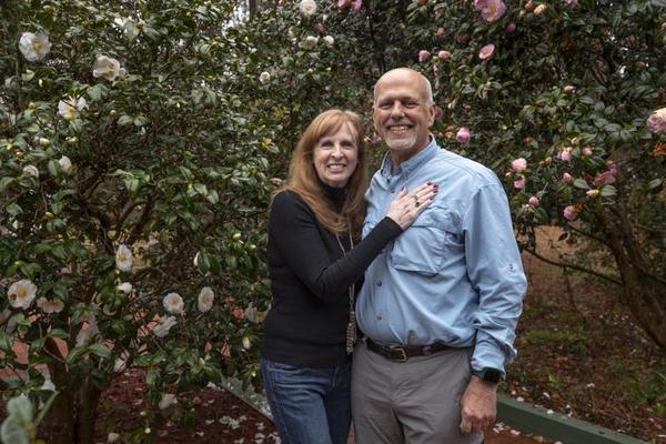 Ellen and Jeff Priest in their yard in Summerville, South Carolina.