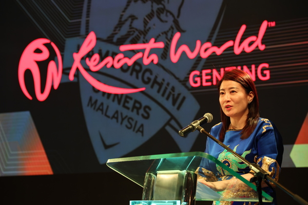 Winnie Lim delivers a speech at the press conference.