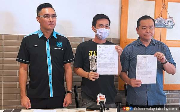 The victim's brother (centre) with Deric Teh (right) and Daniel Khoo (left).