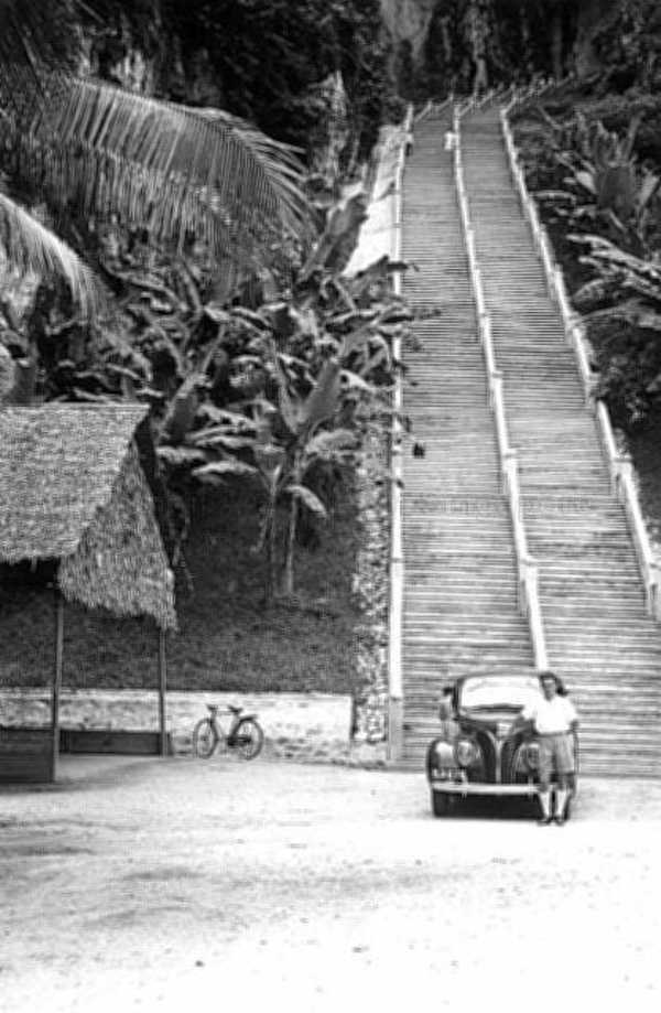 The foot of steps leading up to entrance of Batu Caves in Selangor, Malaya sometime between 1937 and 1938.