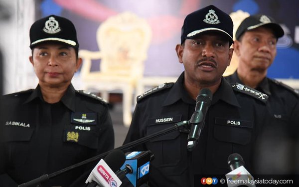 Selangor police chief Datuk Hussein Omar Khan (centre).