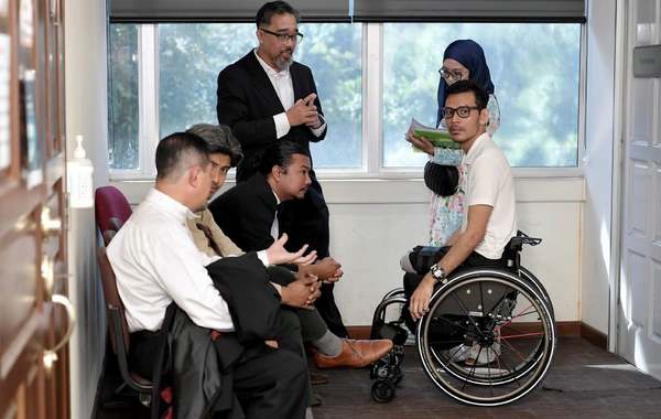 Isman is now a wheelchair user after an alleged botched surgery that resulted in the loss of his legs.
