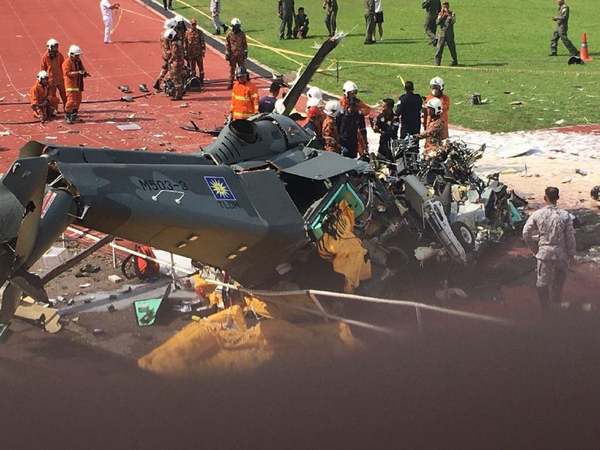 Wreckage of one of the two helicopters that collided and crashed at TLDM's base in Lumut.