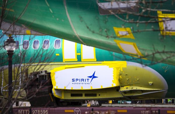 A Spirit AeroSystems logo on a Boeing 737 MAX fuselage.