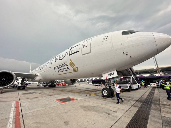A Singapore airline aircraft is seen on tarmac after requesting an emergency landing at Bangkok's Suvarnabhumi International Airport, Thailand, 21 May.