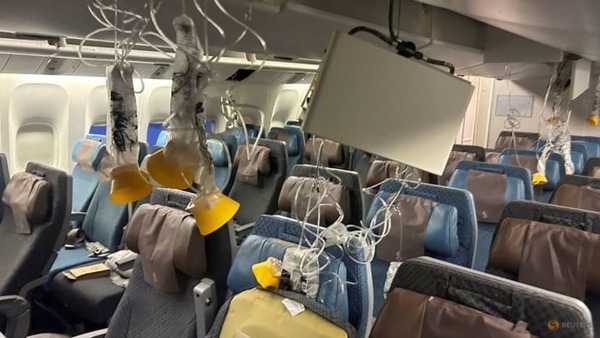 The interior of Singapore Airline flight SQ321 after its emergency landing at Bangkok's Suvarnabhumi International Airport.