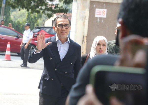 Fahmi Abd Moin (left), one of the lawyers representing Zayn Rayyan's parents.