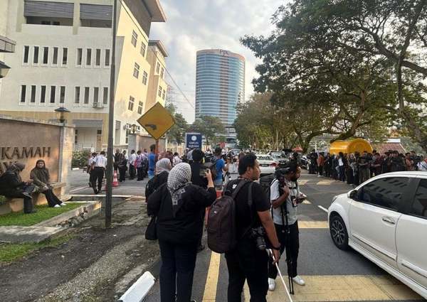 Media personnel seen gathered outside the court as early as 7.30am today, 14 June.