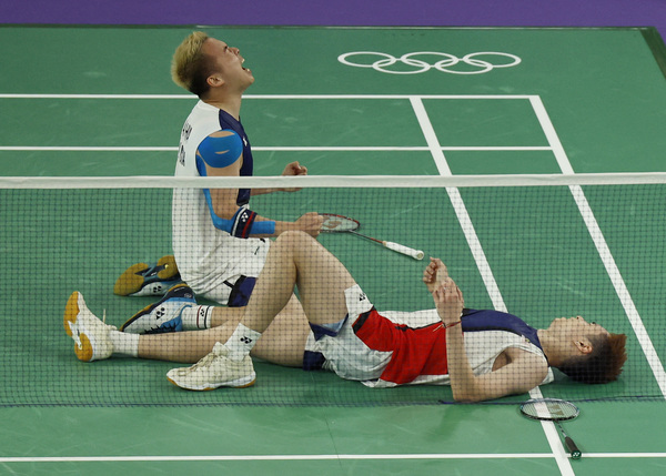 Chia and Soh's reaction after winning the bronze medal match.