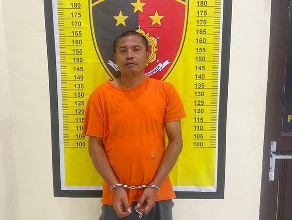 Parlindungan Siregar at the police station following his arrest.