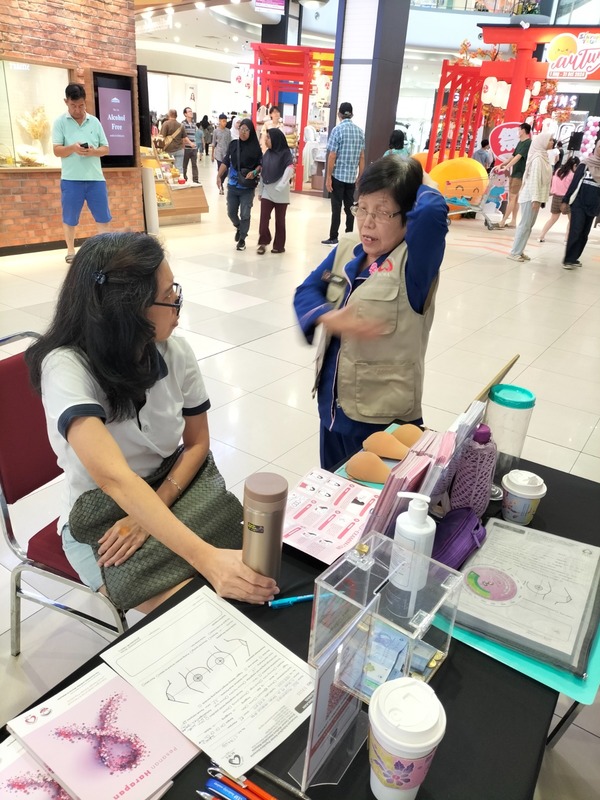 BCWA Malaysia often has booths at malls throughout Malaysia to teach women how to perform a BSE.