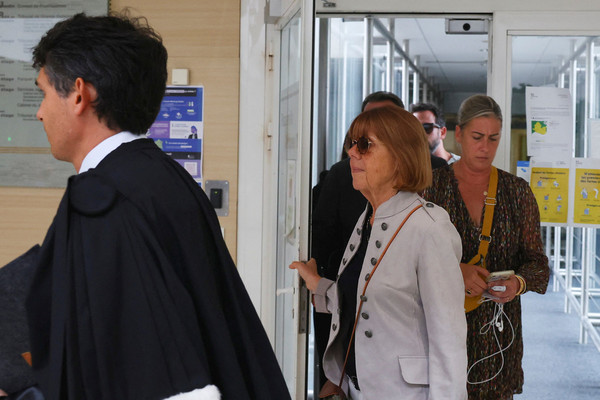 Pelicot's wife entering the courthouse in Avignon, France.