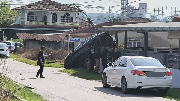 The police vehicle that was damaged during the operation.