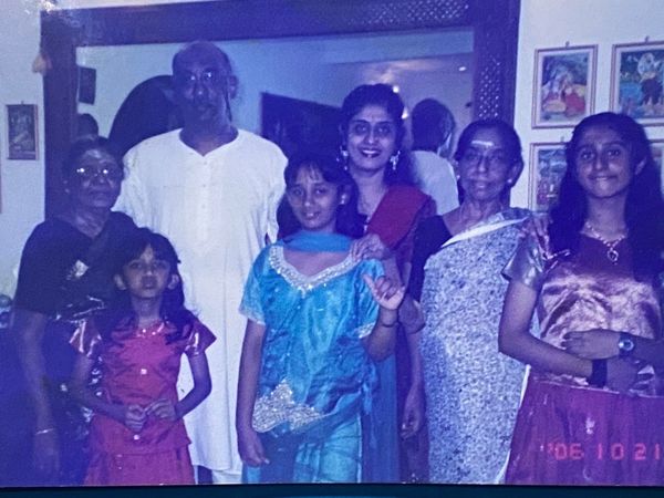 Tushaara (center) in a blue lehenga.