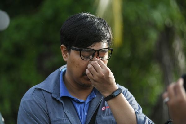 Muhammad Amir Hakimi Sabari at the location where his father's body is believed to have been dumped.