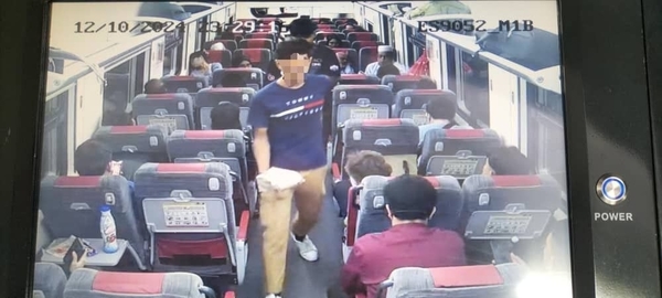 A separate photo of the perpetrator inside the train.