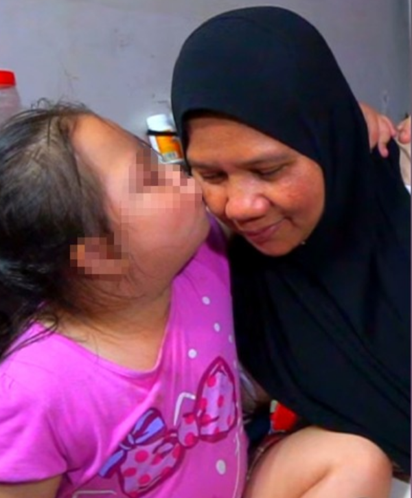 Noraniza Ismail and her daughter, who has Down's Syndrome.