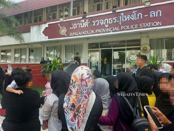 Crowds gathering outside Sungai Kolok police station in Narathiwat, Thailand on Monday, 4 November.