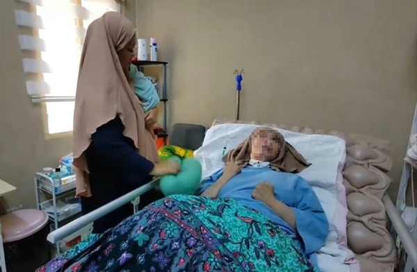 Jahidah Nordin has been left bedridden following the assault.