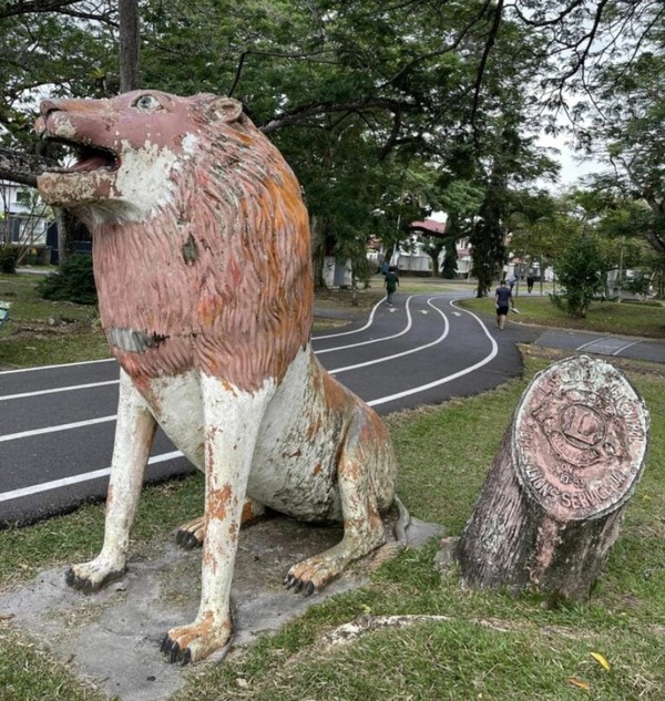 The lion statue before it was repainted.