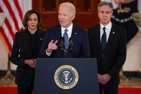 US President Joe Biden (middle) delivers remarks on a Gaza ceasefire deal at the White House in Washington.