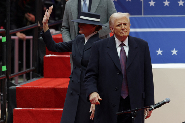 US President Donald Trump and first lady Melania Trump arrive at Capital One arena on the inauguration day of his second presidential term in Washington on 20 January.