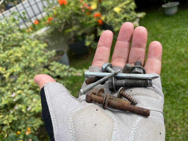 Nails, bolts, and screws that Bujang and Marjian collected in recent weeks.