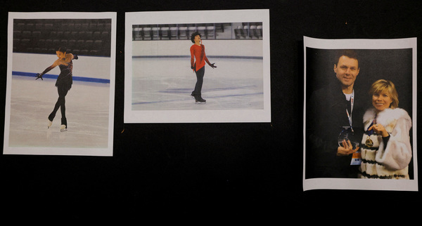 Photographs of athletes Jinna Han and Spencer Lane, and coaches Vadim Naumov and Evgenia Shishkova, all of whom died in the crash of American Eagle flight 5342 in Washington, DC, are displayed at the Skating Club of Boston in Norwood, Massachusetts, U.S., 30 January, 2025.