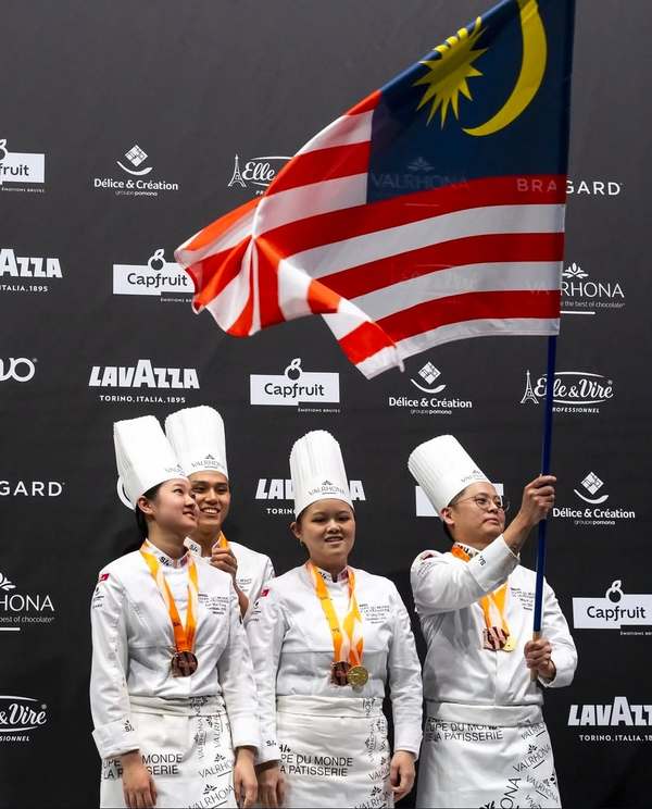 From left: Fong Kah Mun, Tyler Tan, Foo Yi Qing, and coach Loi Ming Ai.