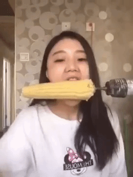 This Girl Tried To Eat Corn with A Spinning Drill And 