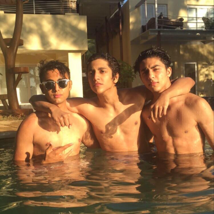 Aryan (right) swimming with his friends. 