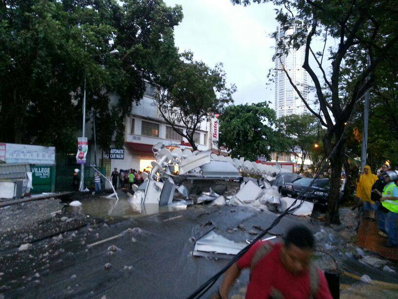[VIDEO/PICS] Storm In Penang: Missing Hawker Laid To Rest