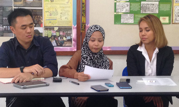 From left: Legal aide Jubili Anilik, Siti Nafirah Siman, and her lawyer Rozana Jamaludin.