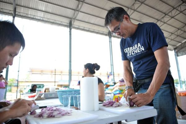 William Cheah (right), co-founder of social enterprise Kembara Kitchen.