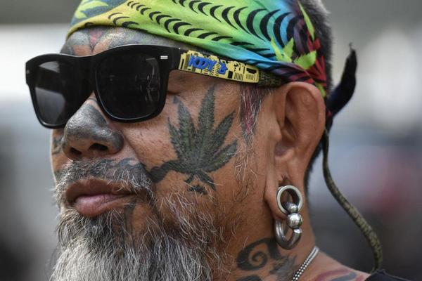 thai person activist marijuana tattoo